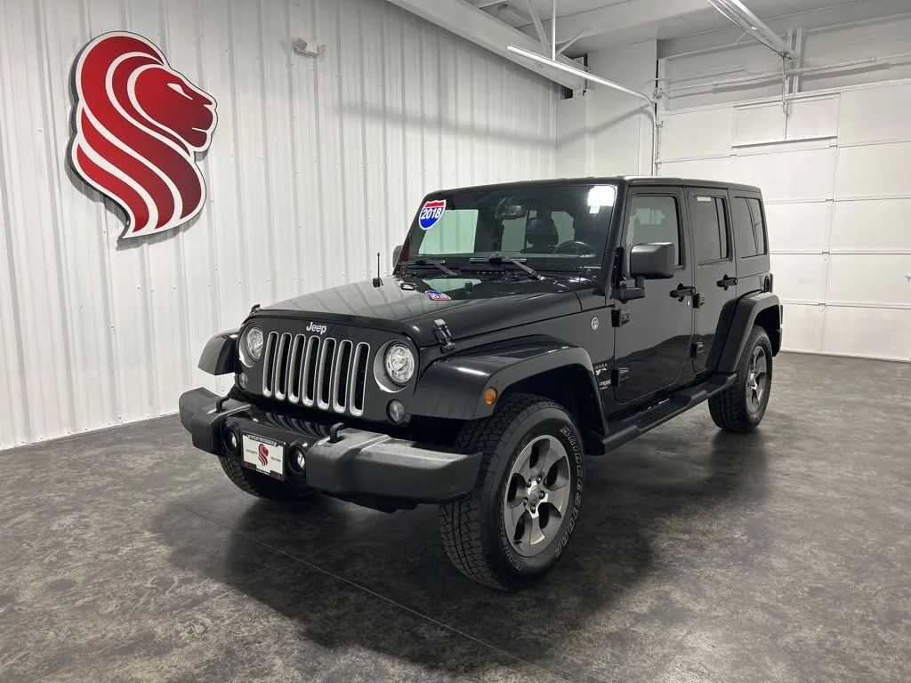 Black 2018 Jeep Wrangler JK Unlimited Sahara for sale in Evansville, IN