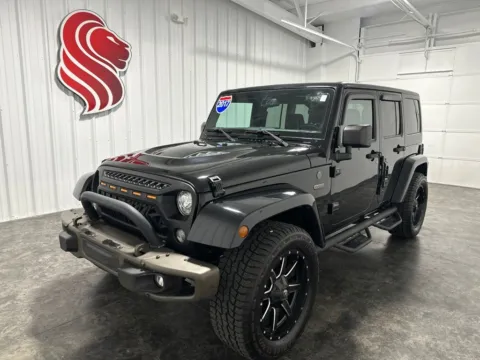 Black 2017 Jeep Wrangler Unlimited Sahara for sale in Evansville, IN