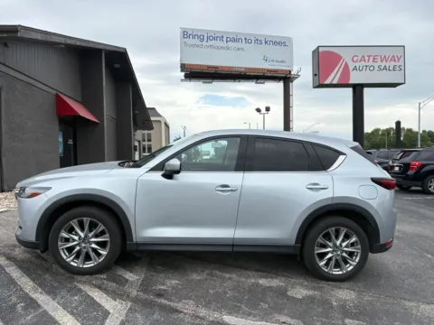 Photos of 2021 MAZDA CX-5 Grand Touring Sport Utility 4D for sale in Omaha, NE at Gateway Auto Sales