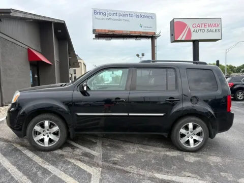 Photos of 2014 Honda Pilot Touring Sport Utility 4D for sale in Omaha, NE at Gateway Auto Sales