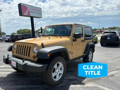 Yellow 2013 Jeep Wrangler Sport SUV 2D for sale in Omaha, NE