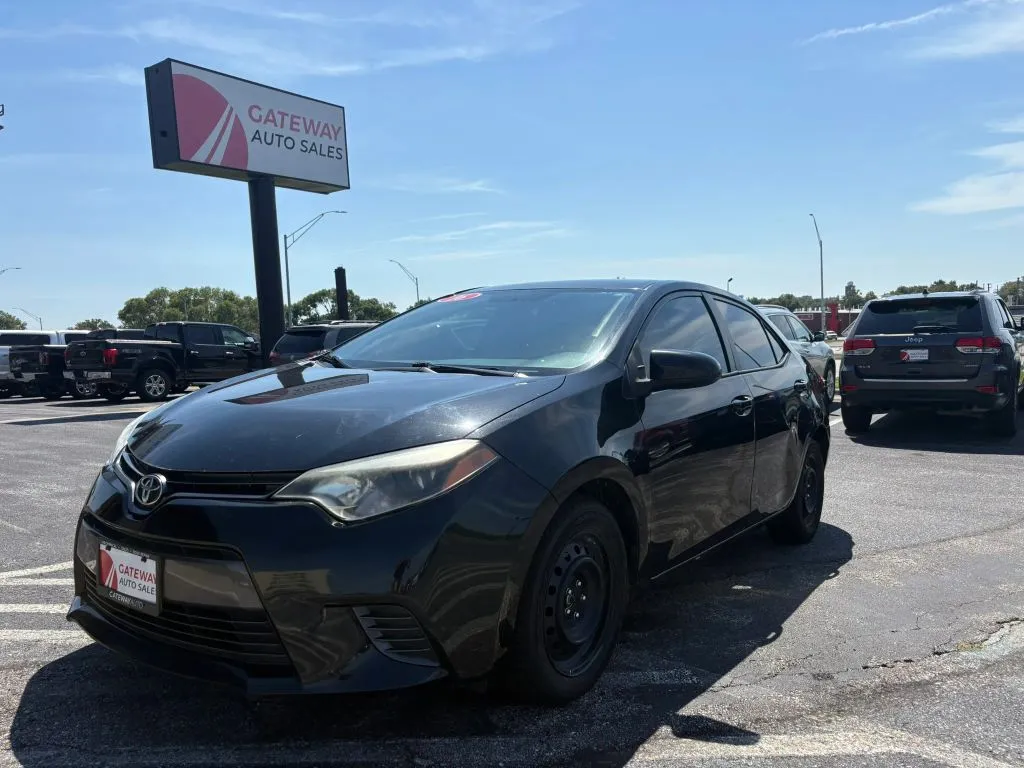 Black 2016 Toyota Corolla LE Sedan 4D for sale in Omaha, NE