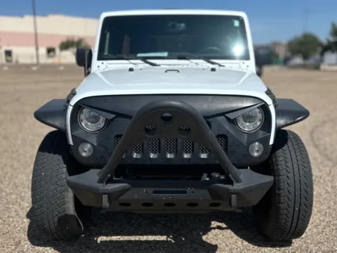 Photos of 2017 JEEP WRANGLER UNLIMI SAHARA for sale in Lubbock, TX at Shift Automotive Group
