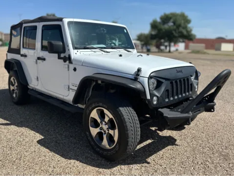 Another view of 2017 JEEP WRANGLER UNLIMI SAHARA for sale in Lubbock, TX at Shift Automotive Group