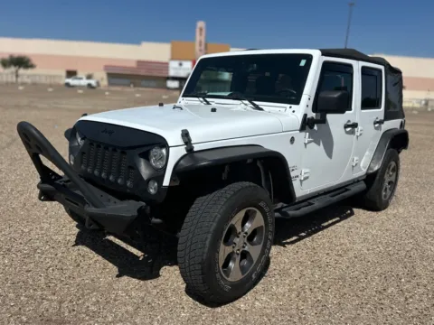 White 2017 JEEP WRANGLER UNLIMI SAHARA for sale in Lubbock, TX