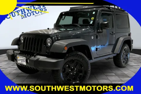 Gray 2017 Jeep Wrangler Willys Wheeler for sale in Pueblo, CO