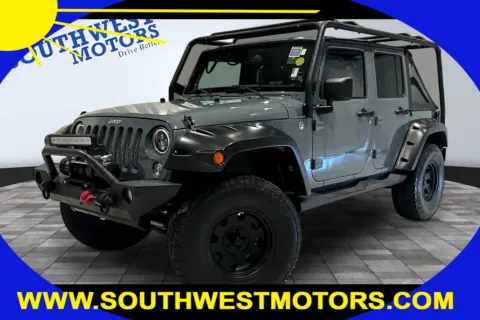 Gray 2014 Jeep Wrangler Unlimited Sahara for sale in Pueblo, CO