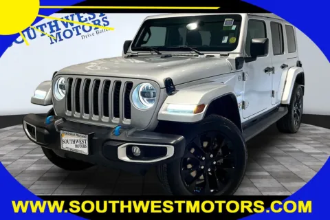 Silver 2023 Jeep Wrangler 4xe Sahara for sale in Pueblo, CO