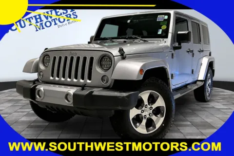 Silver 2016 Jeep Wrangler Unlimited Sahara for sale in Pueblo, CO