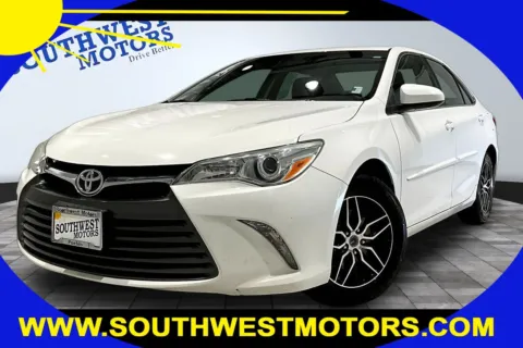 White 2015 Toyota Camry LE for sale in Pueblo, CO
