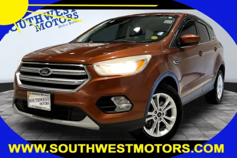 Orange 2017 Ford Escape SE for sale in Pueblo, CO