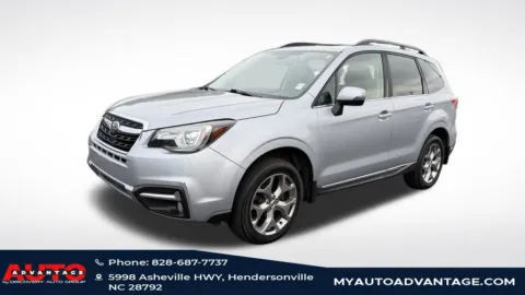 Silver 2017 Subaru Forester 2.5i Touring for sale in Hendersonville, NC
