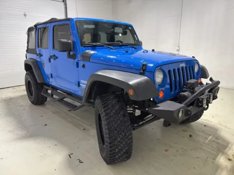 Another view of 2012 Jeep Wrangler Unlimited Sport for sale in Fishers, IN at Fishers Imports - North East