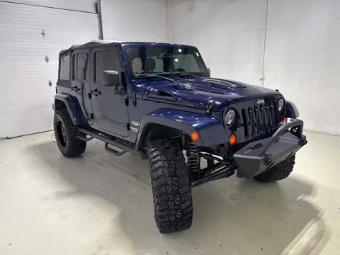 Another view of 2013 Jeep Wrangler Unlimited Sahara for sale in Fishers, IN at Fishers Imports - North East