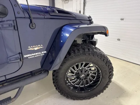 More photos of 2013 Jeep Wrangler Unlimited Sahara at Fishers Imports - North East, IN