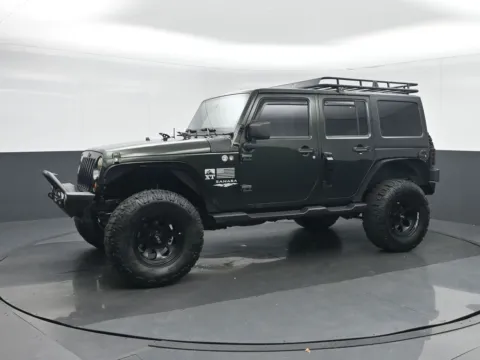 Another view of 2012 Jeep Wrangler Unlimited Sahara for sale in Fredericksburg, VA at Sullivan Auto Trading Fredericksburg