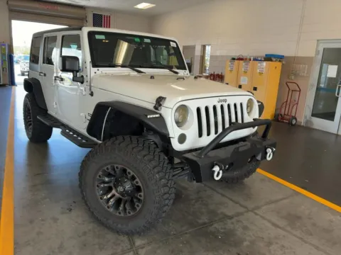 Photos of 2017 Jeep Wrangler Unlimited Sport for sale in Fredericksburg, VA at Sullivan Auto Trading Fredericksburg