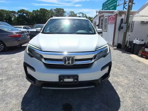 Photos of 2022 Honda Pilot Touring for sale in Fredericksburg, VA at Sullivan Auto Trading Fredericksburg