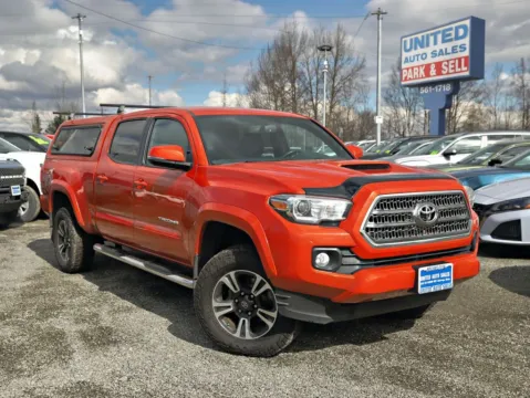 Orange 2017 Toyota Tacoma Double Cab TRD Sport Pickup 4D 6 ft for sale in Anchorage, AK