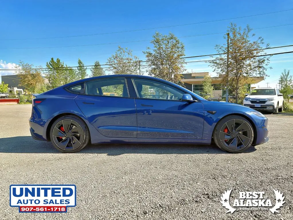 Tesla Model 3 photo 4