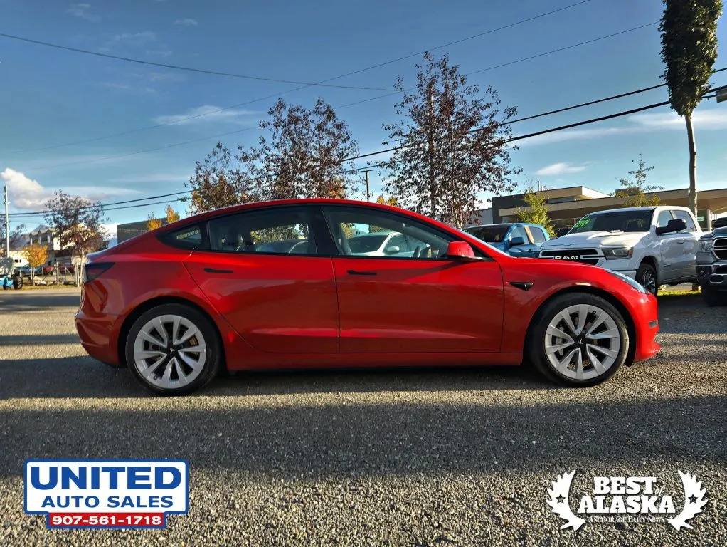 Tesla Model 3 photo 7