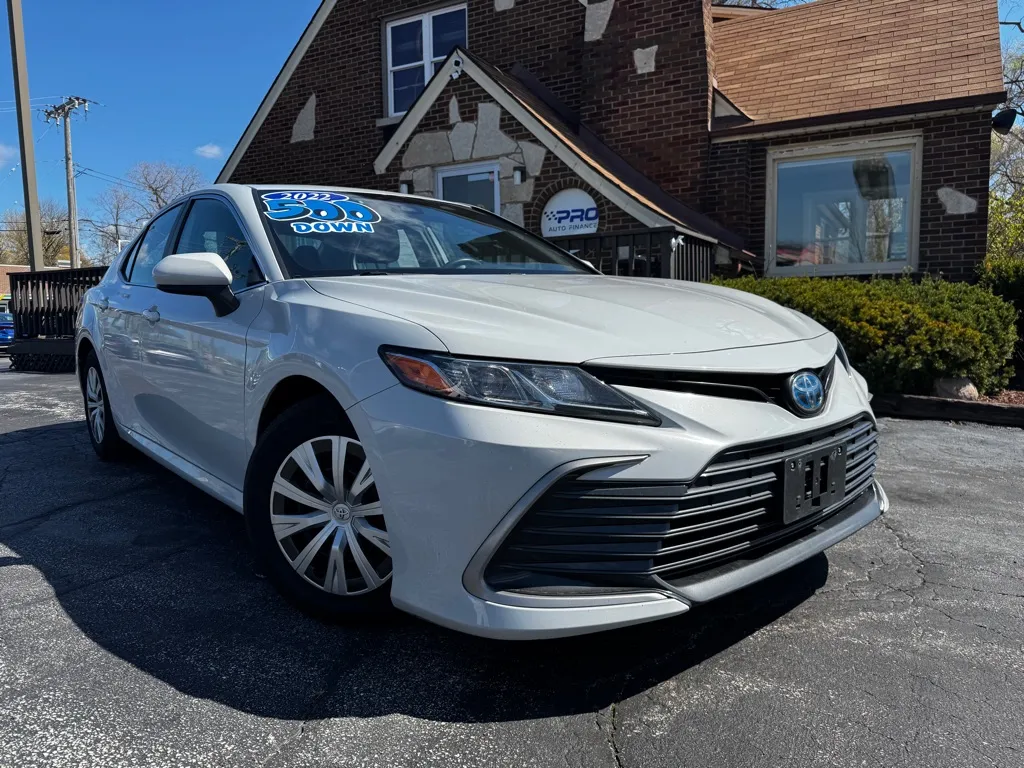 Gray 2022 TOYOTA CAMRY HYBRID LE for sale in Highland, IN