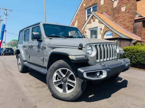 Gray 2021 JEEP WRANGLER UNLIMI SAHARA for sale in Highland, IN