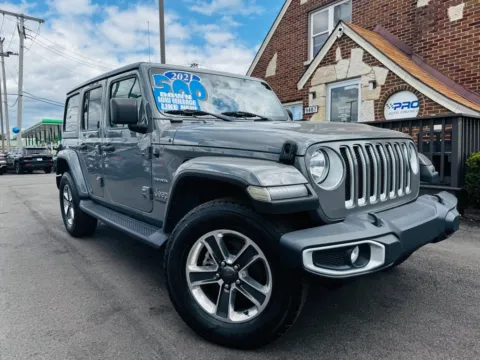 Gray 2021 JEEP WRANGLER UNLIMI SAHARA for sale in Highland, IN