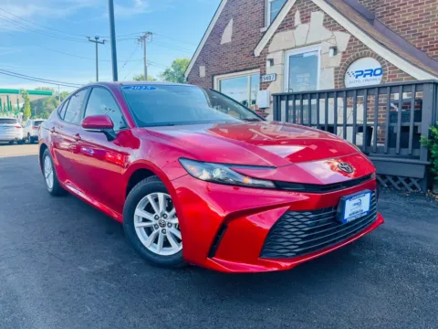 Red 2025 TOYOTA CAMRY LE for sale in Highland, IN