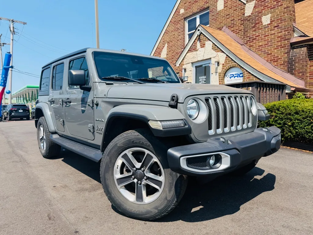 Gray 2021 JEEP WRANGLER UNLIMI SAHARA for sale in Highland, IN