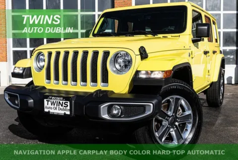 Yellow 2023 Jeep Wrangler Sahara for sale in Dublin, OH