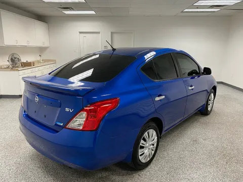 More photos of 2013 Nissan Versa 4d Sedan SV at Ideal Cars Service Center, AZ