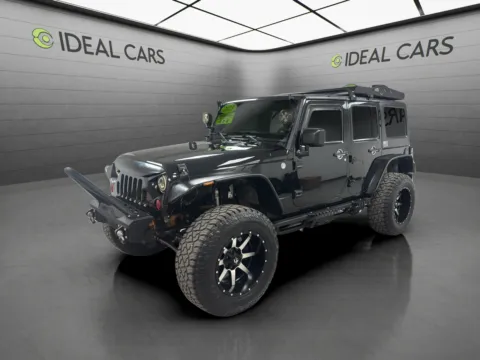 Black 2013 Jeep Wrangler Unlimited Sport for sale in Mesa, AZ