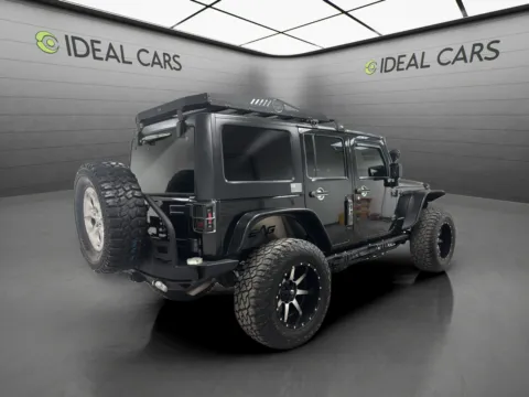 More photos of 2013 Jeep Wrangler Unlimited Sport at Ideal Cars Service Center, AZ