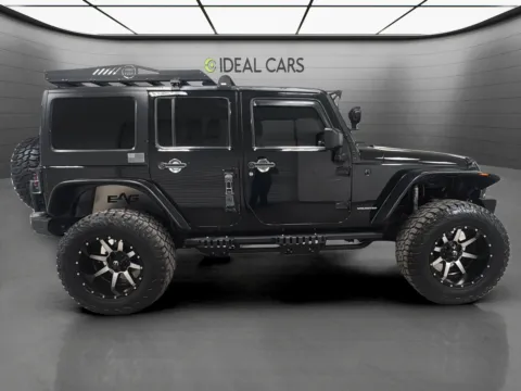 More photos of 2013 Jeep Wrangler Unlimited Sport at Ideal Cars Service Center, AZ
