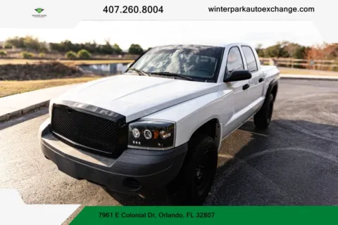 Silver 2006 Dodge Dakota Quad Cab ST Pickup 4D 5 1/2 ft for sale in Orlando, FL
