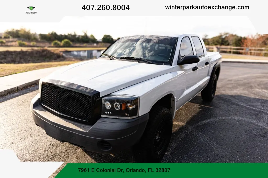 Silver 2006 Dodge Dakota Quad Cab ST Pickup 4D 5 1/2 ft for sale in Orlando, FL