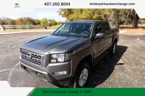Silver 2022 Nissan Frontier Crew Cab SV Pickup 4D 5 ft for sale in Orlando, FL