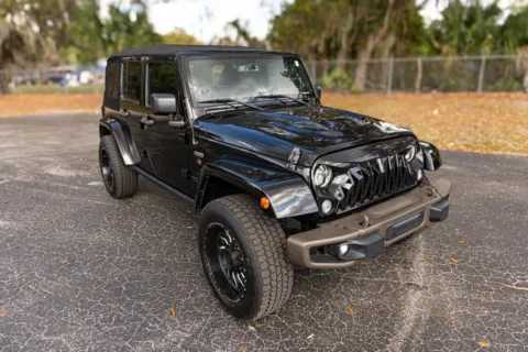 Another view of 2017 Jeep Wrangler Unlimited 75th Anniversary Edition Sport Utility 4D for sale in Orlando, FL at Winter Park Auto Exchange