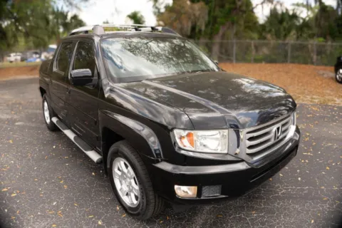Another view of 2014 Honda Ridgeline RTS Pickup 4D 5 ft for sale in Orlando, FL at Winter Park Auto Exchange