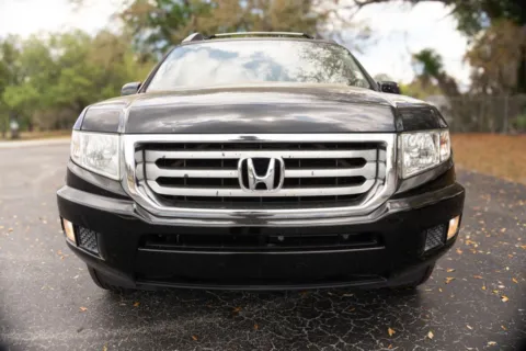 Photos of 2014 Honda Ridgeline RTS Pickup 4D 5 ft for sale in Orlando, FL at Winter Park Auto Exchange