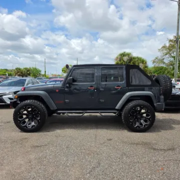 Photos of 2017 Jeep Wrangler Unlimited Sport SUV 4D for sale in Orlando, FL at Winter Park Auto Exchange