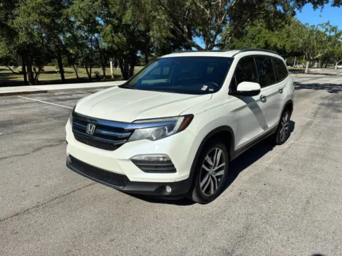 Another view of 2017 Honda Pilot Elite Sport Utility 4D for sale in Orlando, FL at Winter Park Auto Exchange