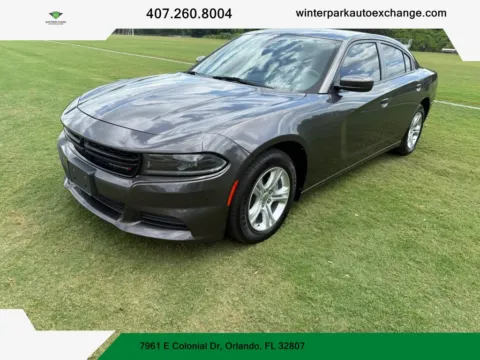 Black 2022 Dodge Charger SXT Sedan 4D for sale in Orlando, FL