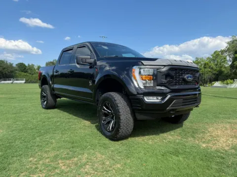 Another view of 2021 Ford F-150 SuperCrew Cab Black Widow XLT Pickup 4D 5 1/2 ft for sale in Orlando, FL at Winter Park Auto Exchange