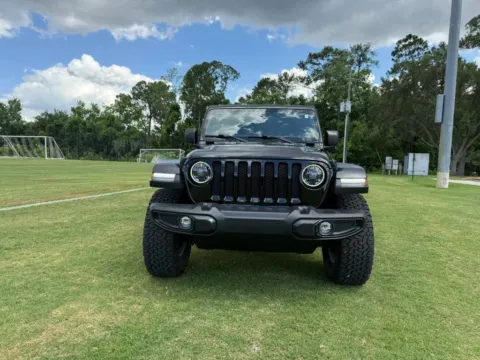 Photos of 2023 Jeep Wrangler Unlimited High Tide Sport Utility 4D for sale in Orlando, FL at Winter Park Auto Exchange