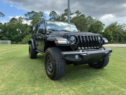 Another view of 2023 Jeep Wrangler Unlimited High Tide Sport Utility 4D for sale in Orlando, FL at Winter Park Auto Exchange