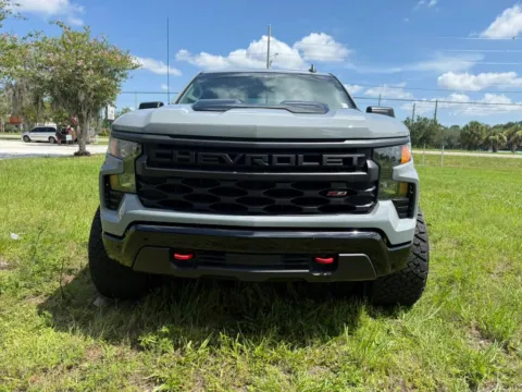 Photos of 2024 Chevrolet Silverado 1500 Crew Cab Custom Trail Boss Pickup 4D 5 3/4 ft for sale in Orlando, FL at Winter Park Auto Exchange
