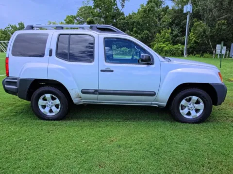 Another view of 2013 Nissan Xterra S Sport Utility 4D for sale in Orlando, FL at Winter Park Auto Exchange