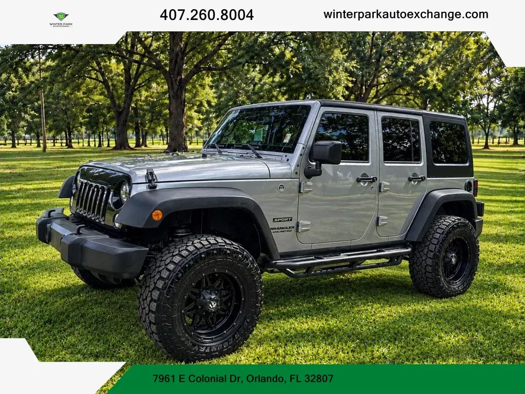 Silver 2016 Jeep Wrangler Unlimited Sport SUV 4D for sale in Orlando, FL